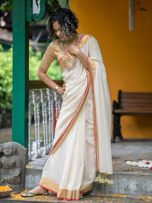 Vennilaa – Cream Mul Cotton Saree with Red & Gold Border
